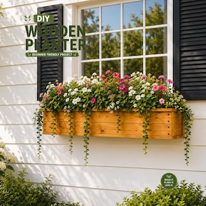May include: A rectangular wooden planter box mounted under a window, filled with vibrant pink and white flowers and trailing green vines. The text DIY WOODEN PLANTER BEGINNER FRIENDLY PROJECT and BUILD IT PLANT IT LOVE IT are visible on the image.