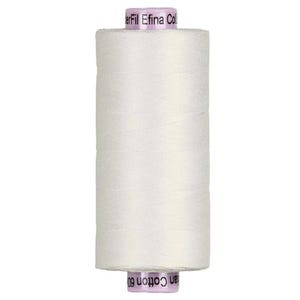 May include: A spool of white cotton thread. The thread is tightly wound around a cylindrical core. The spool has a light purple label with the text "erFil Efina Col" and "an Cotton 60".