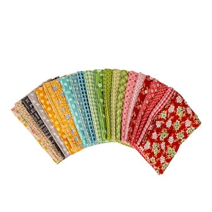 May include: A collection of 20 fabric strips in various patterns and colors, including red, green, blue, yellow, and white. The fabric strips are arranged in a fan shape, with the red and white strips at the bottom and the green and blue strips at the top.