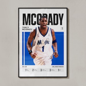 May include: A framed poster featuring a basketball player in a white Orlando Magic jersey with the number 1. The text reads MCGRADY, TRACY MCGRADY, SG/SF, ORLANDO MAGIC, and lists various NBA career achievements including All-Star and All-NBA team selections.