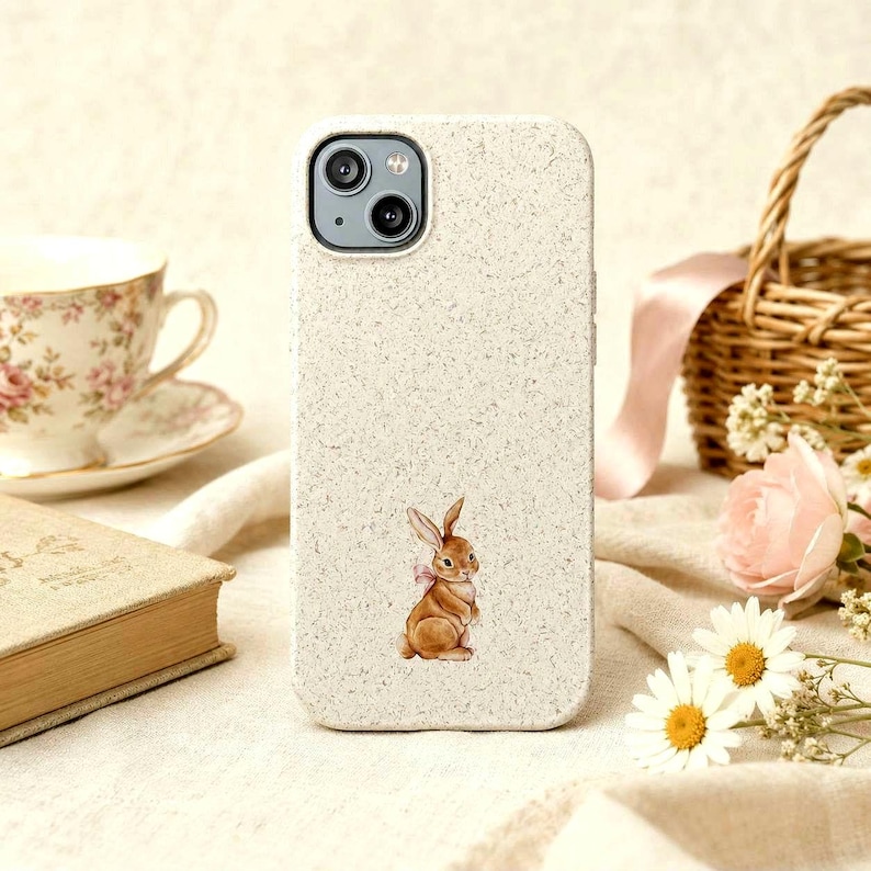 Bow bunny phone case styled with book and daisies