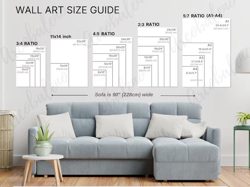 May include: A wall art size guide with different ratios for wall art prints. The guide shows the dimensions of each size in inches and centimeters. The guide also includes a sofa that is 90 inches wide.