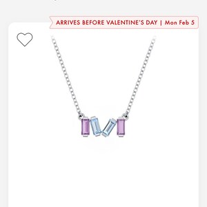 May include: A silver chain necklace with a scattering of light blue and purple baguette-shaped gemstones. The necklace is displayed on a white background. Arrives before Valentine's Day | Mon Feb 5.