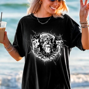 Cerberus Doberman Shirt – 3 Headed Dog Graphic Tee – Dark Electric Hellhound T-Shirt – Black Oversized Comfort Colors Shirt