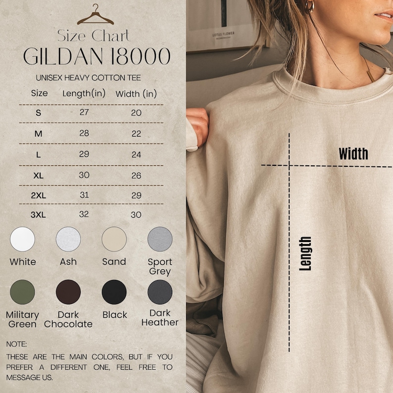 May include: A Gildan 18000 unisex heavy cotton crewneck sweatshirt in sand. The image includes a size chart with length and width measurements in inches for sizes S through 3XL, and a color palette showing white, ash, sand, sport grey, military green, dark chocolate, black, and dark heather options.