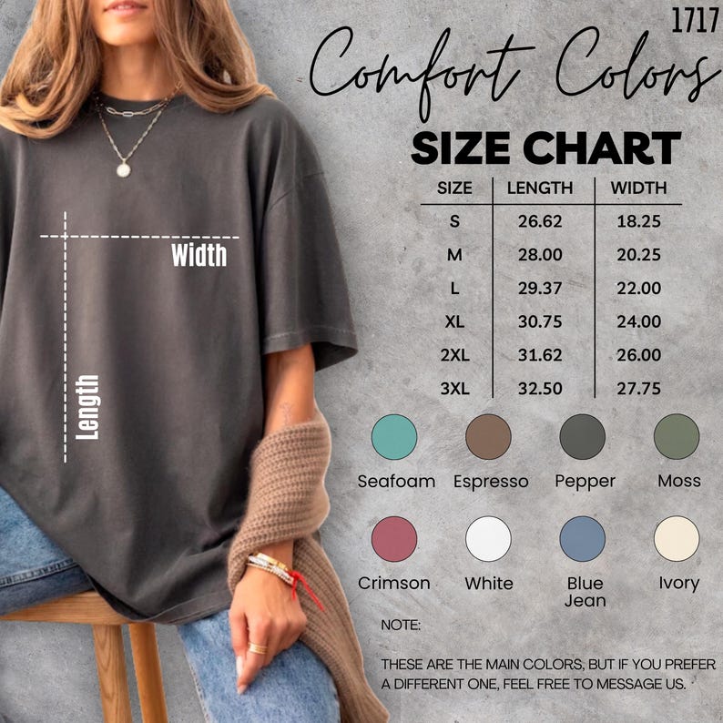 May include: A dark gray t-shirt with a size chart and color options. The size chart lists measurements in inches for sizes S through 3XL. Color options include seafoam, espresso, pepper, moss, crimson, white, blue jean, and ivory.