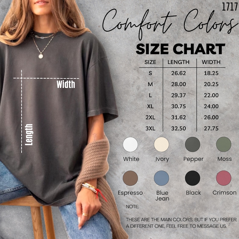 May include: A dark grey Comfort Colors t-shirt with a size chart and colour options. The size chart shows measurements in inches for sizes S to 3XL. Available colours include white, ivory, pepper, moss, espresso, blue jean, black, and crimson.