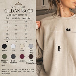 May include: A size chart for a Gildan 18000 unisex heavy cotton tee. The chart shows sizes S to 3XL with length and width measurements in inches. Color options include black, ash, sand, sport grey, military green, dark heather, maroon, and dark chocolate.