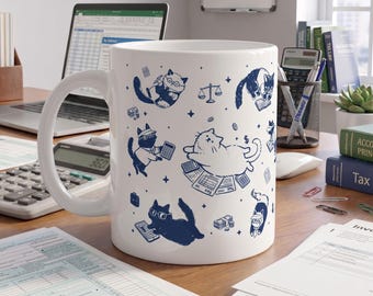May include: A white ceramic mug featuring a repeating pattern of dark blue illustrations of cats engaged in accounting and office tasks, including cats with calculators, glasses, briefcases, stacks of money, and scales of justice.