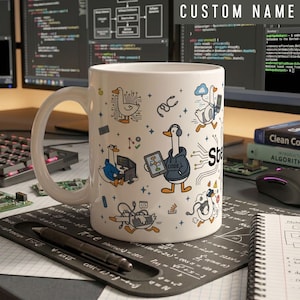 May include: A white ceramic mug featuring a repeating pattern of cartoon geese engaged in various computing activities, including coding, using laptops, and wearing headphones, with the text "CUSTOM NAME" printed at the top.