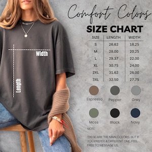 May include: A size chart for Comfort Colors apparel, with measurements in inches for sizes S through 3XL. The chart includes length and width dimensions. Color options include Espresso, Pepper, Grey, Moss, Black, and Navy.