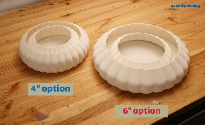 This is a white, 3d printed light shade that mounts onto 4 inch recessed lights. It diffuses the light beautifully, changing the harsh overhead light of recessed lighting into a soft glow, and provides a beautiful decorative touch as well. It has an elegant, scalloped edge and which has floral feeling to it. No hardware is needed to install the light, it comes with easy-to-install tabs that make install or changing a bulb simple.