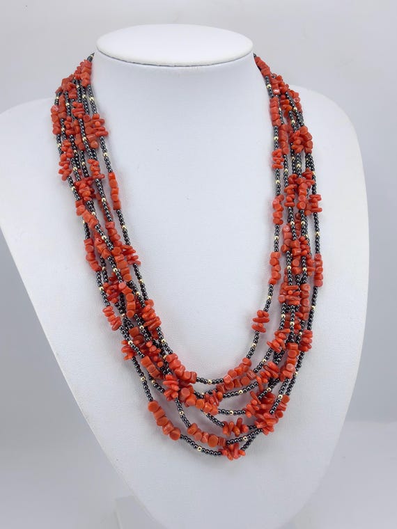 Multi-strand MEDITERRANEAN RED CORAL necklace with grey and gold hematite and gold-plated 925 silver clasp