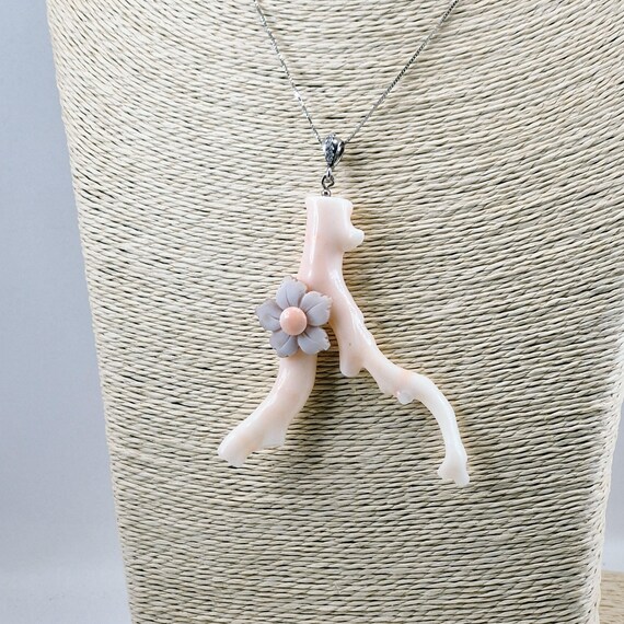 Pink coral branch and cameo flower