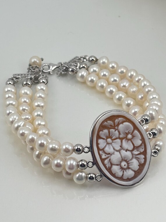 3-strand bracelet with PEARLS, floral CAMEO engraved on a Madagascan cassis shell mounted in 925 SILVER and zircons