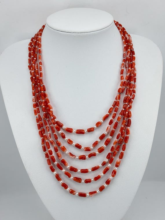 Multi-strand necklace in dark coral from the seas of Japan and cultured freshwater pearls with a 925 silver clasp