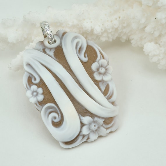 Cameo pendant engraved on Cassis Madagascariensis shell, 925 silver, zircons