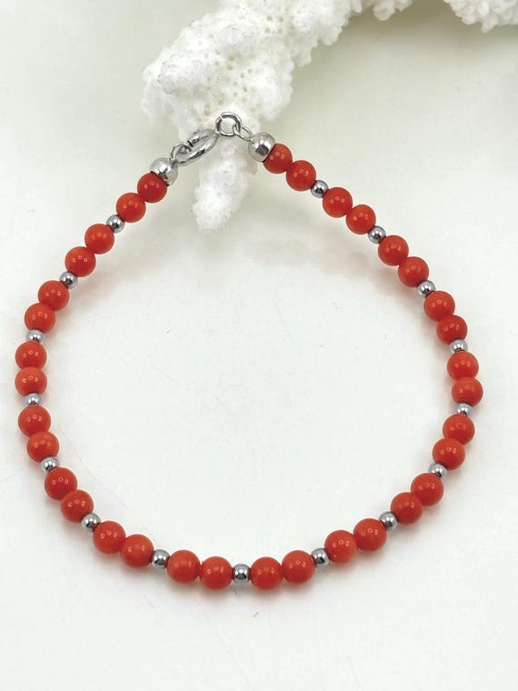 Bracelet in natural red CORAL from the Mediterranean Sea, alternating with spheres in grey HEMATITE with a 925 SILVER clasp