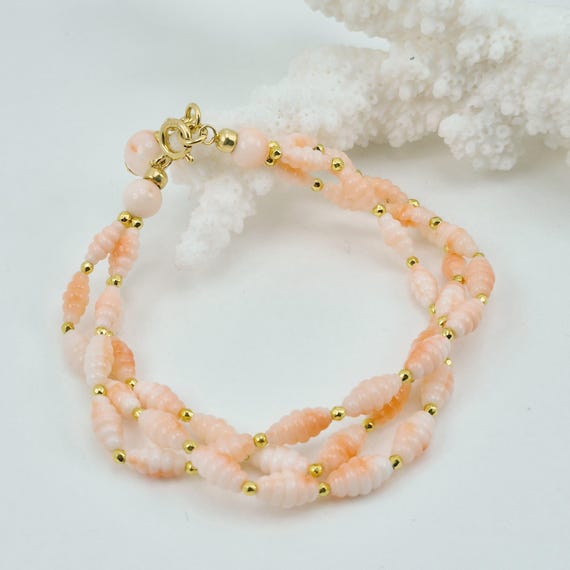 Bracelet in engraved PINK CORAL, from the Asian seas, with a gold-plated 925 silver clasp.