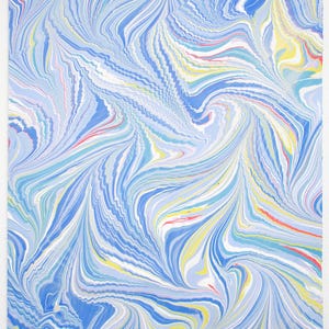 May include: Abstract artwork featuring a swirling pattern of blue, white, yellow, and red lines. The design resembles flowing water or marbled paper. The artwork is on a white background.