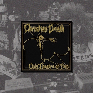 Puede incluir: Portada de álbum negra y dorada con el nombre de la banda "Christian Death" y el título del álbum "Only Theatre of Pain".