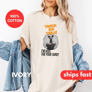 May include: A white t-shirt with the text 