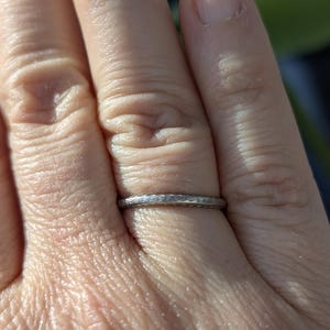 Engraved platinum band in size 6.5