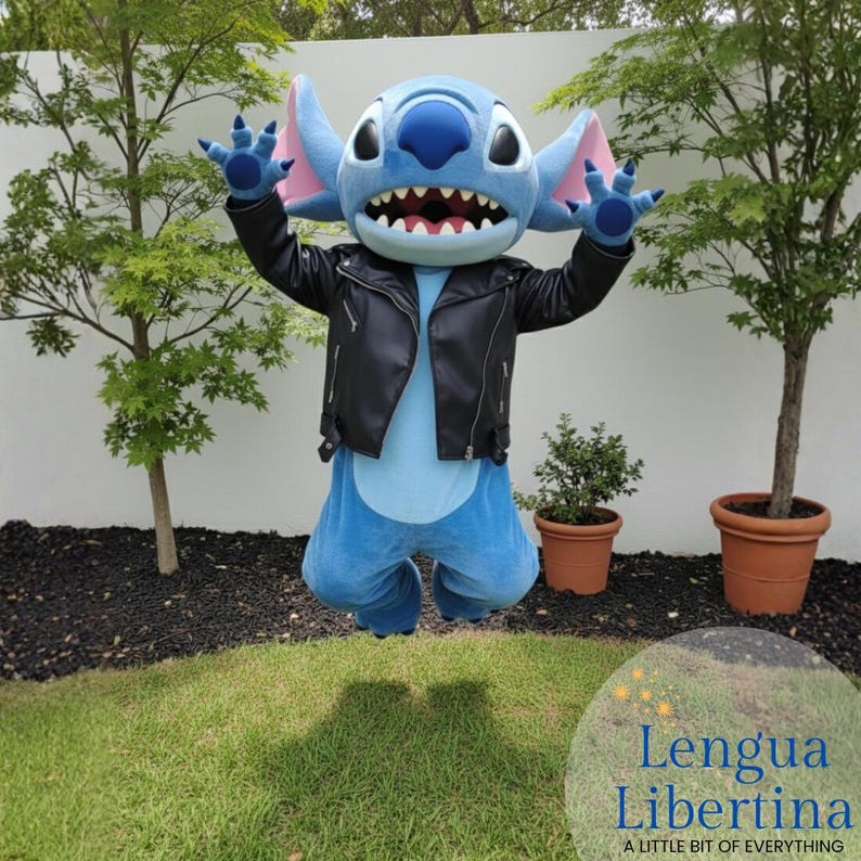 May include: A blue character costume with large ears, a wide grin, and a black leather jacket. The character is jumping in the air with arms raised. The costume is in a grassy area with trees and the text "Lengua Libertina" at the bottom.