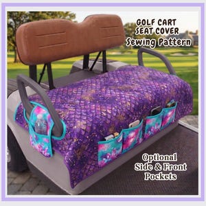May include: A golf cart seat cover featuring a purple dragon scale pattern with gold accents and turquoise pockets. The text reads GOLF CART SEAT COVER Sewing Pattern and Optional Side & Front Pockets. The cover includes multiple storage compartments.