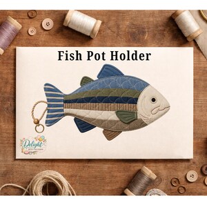 May include: A quilted fish pot holder featuring horizontal stripes in shades of blue, green, and beige, with a small rope loop and ring at the tail. The text "Fish Pot Holder" is printed above the fish, and a small logo is in the bottom corner.
