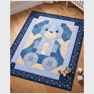 May include: A rectangular quilt featuring a patchwork design of a blue dog in shades of navy, medium blue, and cream. The border is dark navy with the repeating text "STARS & DREAMS" and small star motifs. The quilt has visible quilted stitching.