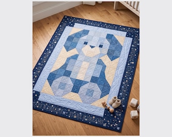 May include: A rectangular quilt featuring a patchwork design of a blue dog in shades of navy, medium blue, and cream. The border is dark navy with the repeating text "STARS & DREAMS" and small star motifs. The quilt has visible quilted stitching.