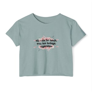 Bodega Crop, Ironic Bodega Cigarettes Lunch Quote Crop Top - White Floral Graphic Tee for Street Style & Whimsical Urban Fashion