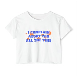 Complain Crop, Cheeky &#39;I Complain About You&#39; White Crop Top Tee - Bold Orange and Blue Text for a Humorous Fashion Statement