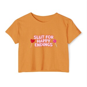 Happy Endings Crop, Playful Lollipop Design Crop Top - Edgy Pink Art Motif on Sunny Tee for Trendsetters