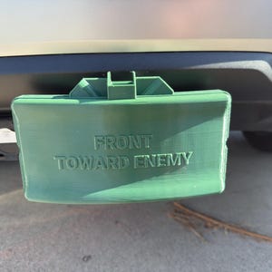 Claymore Mine Trailer Hitch Cover – “Front Toward Enemy” – Military-Inspired Novelty- 2 inch Hitch