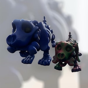 May include: Two skeleton dog figurines, one blue and one green, red, and purple. The blue dog is standing on all fours and the green, red, and purple dog is standing on all fours.