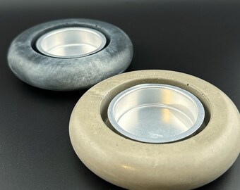 Handcrafted two-piece bisque and blue-gray donut-shaped tea light or votive candle holder