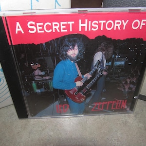 Led Zeppelin - CD muy raro - Una historia secreta - ¡NM!