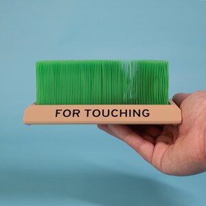 Touch Grass desk toy hand holding size reference funny coworker gift