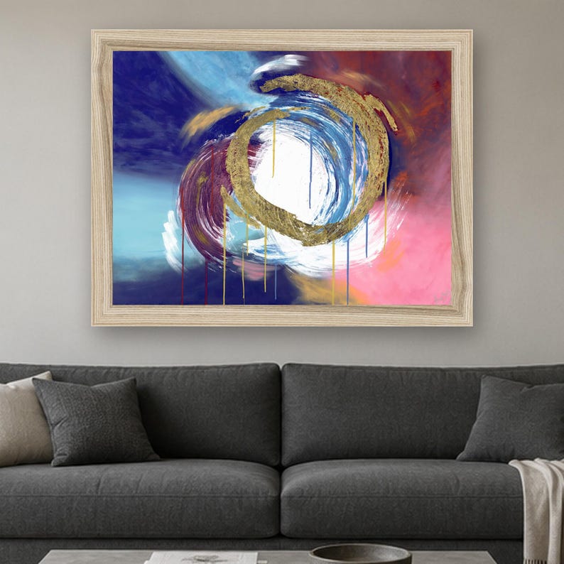 Puede incluir: Una pieza de arte mural rectangular enmarcada que presenta una pintura abstracta con una pincelada circular dorada central. La composici&oacute;n incluye remolinos vibrantes de azul profundo, magenta y blanco, con gotas de pintura verticales hacia abajo.
