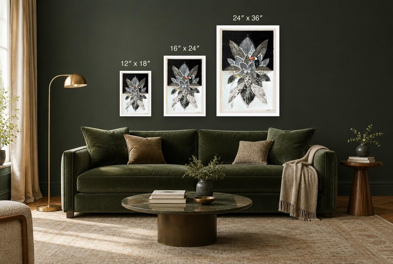 May include: Three framed rectangular wall art prints featuring a botanical and toucan illustration in black, white, and gray. The prints are labeled with dimensions of 12" x 18", 16" x 24", and 24" x 36" respectively, displayed in a horizontal row.