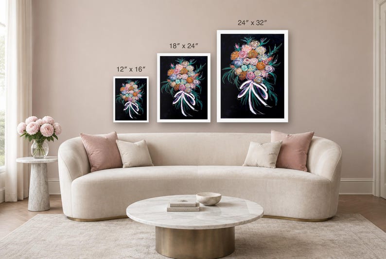 May include: Three rectangular wall art prints featuring a colorful floral bouquet on a black background, tied with a white ribbon. The prints are labeled with dimensions of 12 by 16 inches, 18 by 24 inches, and 24 by 32 inches respectively.
