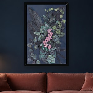 May include: A framed rectangular wall art piece featuring a dark navy blue background with a dense arrangement of textured, deep green and black foliage, accented by a central vertical cluster of five small, light pink, five-petaled flowers.