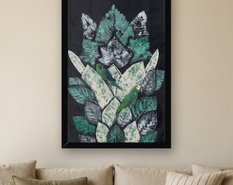 May include: A framed rectangular wall art piece featuring a dark background with a vertical arrangement of layered, textured leaves in shades of green, white, and black. Two small green parrots are perched among the foliage.