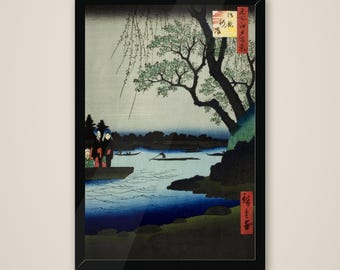 May include: A framed Japanese woodblock print depicting a river scene with a large tree, weeping willow branches, and figures on a boat. The artwork features blue water, dark rocky banks, and red vertical text labels in the upper right and lower right corners.