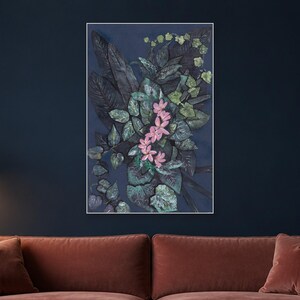 May include: A rectangular wall art piece featuring a dark navy blue background with a dense arrangement of textured, dark green and black foliage. A central cluster of five light pink, five-petaled flowers stands out against the dark leaves.