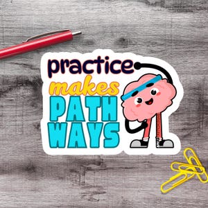 May include: A die-cut sticker featuring a cartoon brain character with a light blue headband, arms, and legs. The text reads practice in dark blue, makes in yellow, and PATHWAYS in bright blue. A red pen and yellow paper clips are nearby.