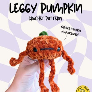 May include: A handmade orange crochet pumpkin with black eyes and a stitched mouth, featuring long, curly legs. The text "LEGGY PUMPKIN CROCHET PATTERN" is displayed above the pumpkin. The phrase "FARMER PUMPKIN MOD INCLUDED!" is also visible.