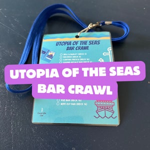May include: A blue lanyard with a card attached. The card is blue and white and has the text "Utopia of the Seas Bar Crawl" on it. The card lists different bars on the ship, including Bell & Barley, Boleros, Cantina Fresca, Casino Royale Bar, Vue Bar, and Wipe Out Bar.